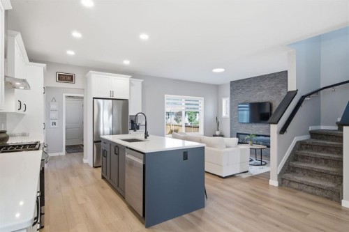 601 Reynolds Crescent Sw, Airdrie, AB - Indoor Photo Showing Kitchen With Stainless Steel Kitchen With Upgraded Kitchen