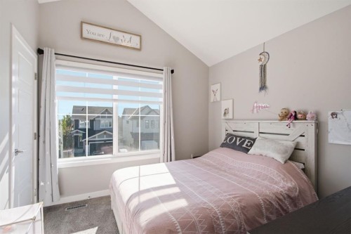 601 Reynolds Crescent Sw, Airdrie, AB - Indoor Photo Showing Bedroom