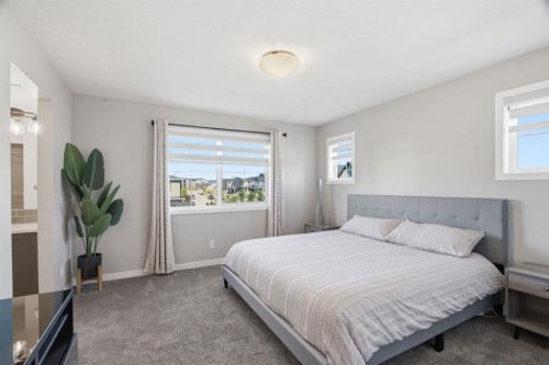 601 Reynolds Crescent Sw, Airdrie, AB - Indoor Photo Showing Bedroom