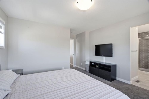 601 Reynolds Crescent Sw, Airdrie, AB - Indoor Photo Showing Bedroom