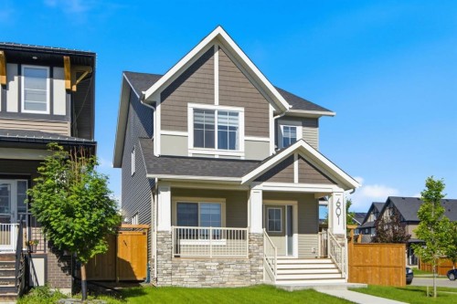 601 Reynolds Crescent Sw, Airdrie, AB - Outdoor With Deck Patio Veranda With Facade