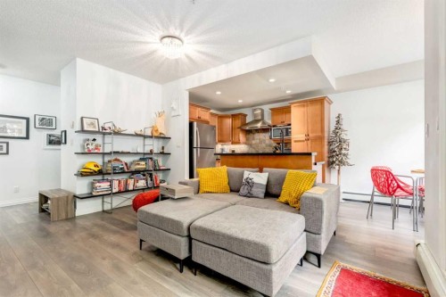 101-532 5 Avenue Ne, Calgary, AB - Indoor Photo Showing Living Room