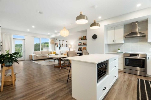 52 Na'A Heights Sw, Calgary, AB - Indoor Photo Showing Kitchen With Upgraded Kitchen