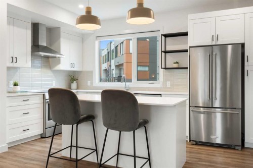 52 Na'A Heights Sw, Calgary, AB - Indoor Photo Showing Kitchen With Stainless Steel Kitchen