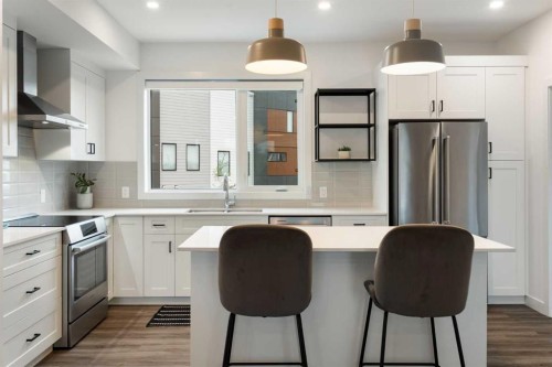 52 Na'A Heights Sw, Calgary, AB - Indoor Photo Showing Kitchen With Stainless Steel Kitchen With Upgraded Kitchen