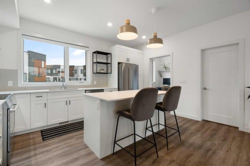 52 Na'A Heights Sw, Calgary, AB - Indoor Photo Showing Kitchen With Upgraded Kitchen