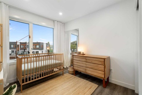 52 Na'A Heights Sw, Calgary, AB - Indoor Photo Showing Bedroom