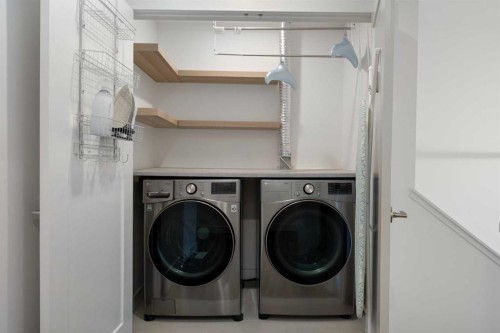 52 Na'A Heights Sw, Calgary, AB - Indoor Photo Showing Laundry Room