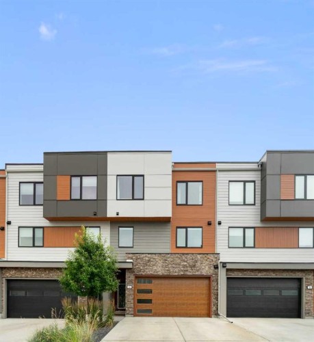 52 Na'A Heights Sw, Calgary, AB - Outdoor With Facade