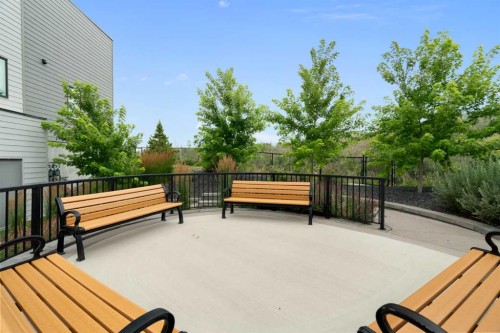 52 Na'A Heights Sw, Calgary, AB - Outdoor With Deck Patio Veranda With Exterior