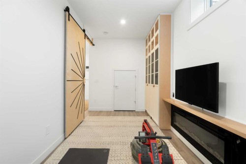 52 Na'A Heights Sw, Calgary, AB - Indoor Photo Showing Other Room