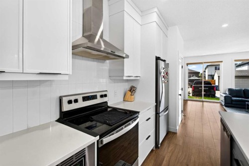 227 Chinook Gate Boulevard Sw, Airdrie, AB - Indoor Photo Showing Kitchen