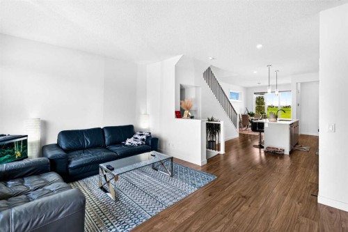 227 Chinook Gate Boulevard Sw, Airdrie, AB - Indoor Photo Showing Living Room