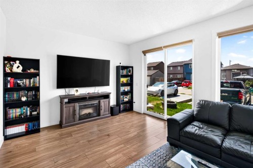 227 Chinook Gate Boulevard Sw, Airdrie, AB - Indoor Photo Showing Living Room
