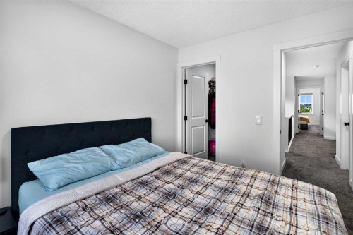 227 Chinook Gate Boulevard Sw, Airdrie, AB - Indoor Photo Showing Bedroom