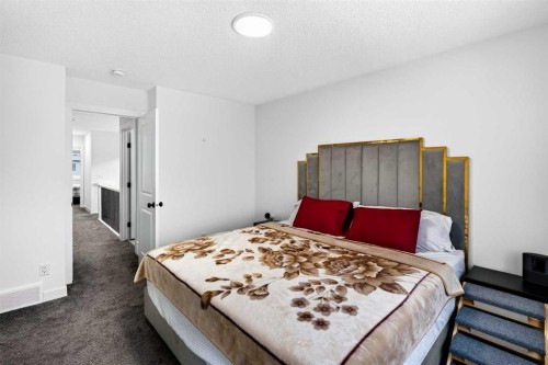 227 Chinook Gate Boulevard Sw, Airdrie, AB - Indoor Photo Showing Bedroom