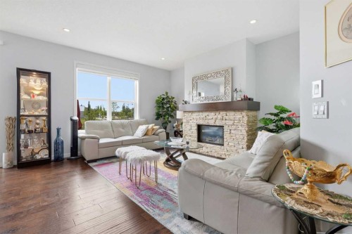 7 Auburn Crest Way Se, Calgary, AB - Indoor Photo Showing Living Room With Fireplace