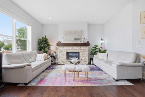 7 Auburn Crest Way Se, Calgary, AB - Indoor Photo Showing Living Room With Fireplace