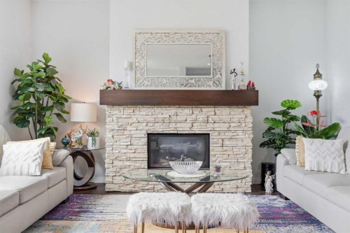 7 Auburn Crest Way Se, Calgary, AB - Indoor Photo Showing Living Room With Fireplace