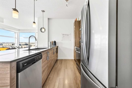 501-122 Mahogany Centre Se, Calgary, AB - Indoor Photo Showing Kitchen With Double Sink With Upgraded Kitchen