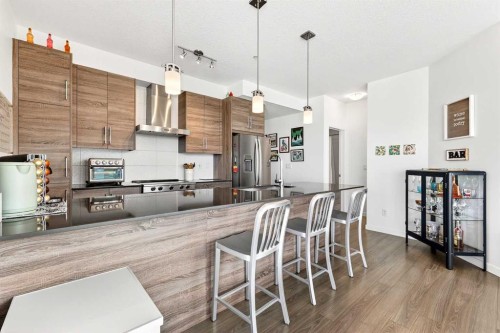 501-122 Mahogany Centre Se, Calgary, AB - Indoor Photo Showing Kitchen With Upgraded Kitchen