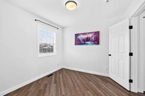 172 Cimarron Grove Crescent, Okotoks, AB - Indoor Photo Showing Other Room