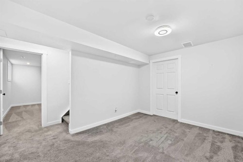 172 Cimarron Grove Crescent, Okotoks, AB - Indoor Photo Showing Other Room