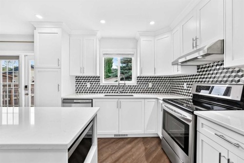 172 Cimarron Grove Crescent, Okotoks, AB - Indoor Photo Showing Kitchen With Stainless Steel Kitchen With Upgraded Kitchen
