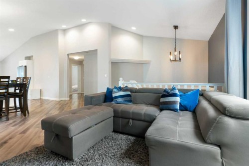 36 Jensen Heights Place Ne, Airdrie, AB - Indoor Photo Showing Living Room