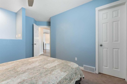 36 Jensen Heights Place Ne, Airdrie, AB - Indoor Photo Showing Bedroom