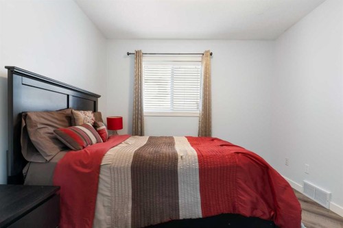 36 Jensen Heights Place Ne, Airdrie, AB - Indoor Photo Showing Bedroom