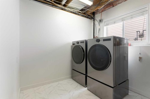 36 Jensen Heights Place Ne, Airdrie, AB - Indoor Photo Showing Laundry Room