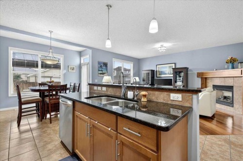 18 Copperstone Drive Se, Calgary, AB - Indoor Photo Showing Kitchen With Double Sink