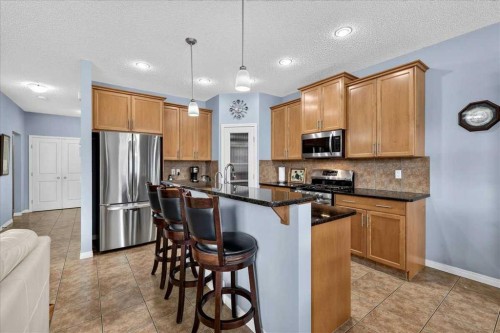 18 Copperstone Drive Se, Calgary, AB - Indoor Photo Showing Kitchen With Stainless Steel Kitchen