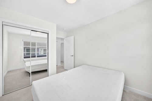 308-135 Belmont Passage Sw, Calgary, AB - Indoor Photo Showing Bedroom