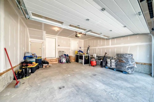 308-135 Belmont Passage Sw, Calgary, AB - Indoor Photo Showing Garage