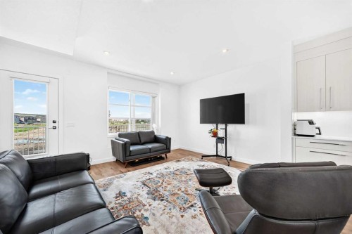 308-135 Belmont Passage Sw, Calgary, AB - Indoor Photo Showing Living Room