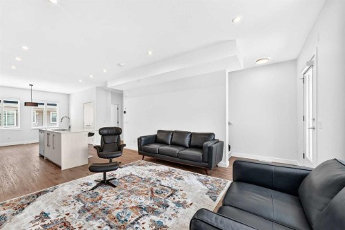 308-135 Belmont Passage Sw, Calgary, AB - Indoor Photo Showing Living Room