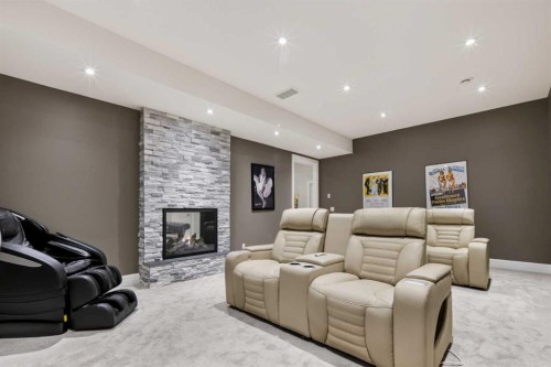 11 Elveden Place Sw, Calgary, AB - Indoor With Fireplace