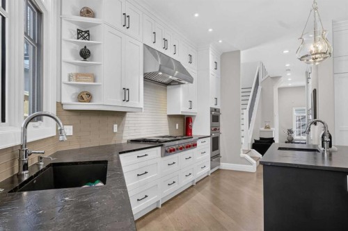 11 Elveden Place Sw, Calgary, AB - Indoor Photo Showing Kitchen With Upgraded Kitchen