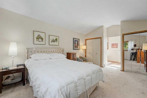 75 Deerbrook Road Se, Calgary, AB - Indoor Photo Showing Bedroom