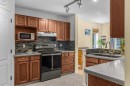 545 Grotto Road, Canmore, AB  - Indoor Photo Showing Kitchen With Double Sink 
