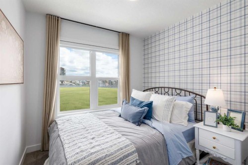 86 Heirloom Passage Se, Calgary, AB - Indoor Photo Showing Bedroom