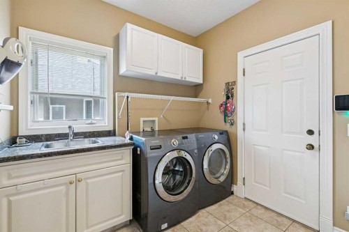 85 Mt Douglas Circle Se, Calgary, AB - Indoor Photo Showing Laundry Room