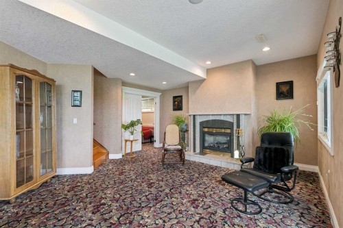 85 Mt Douglas Circle Se, Calgary, AB - Indoor With Fireplace