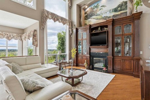 85 Mt Douglas Circle Se, Calgary, AB - Indoor Photo Showing Living Room With Fireplace