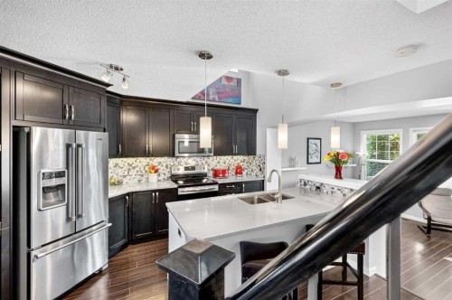 213 Auburn Meadows Way Se, Calgary, AB - Indoor Photo Showing Kitchen With Double Sink With Upgraded Kitchen
