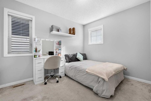 213 Auburn Meadows Way Se, Calgary, AB - Indoor Photo Showing Bedroom