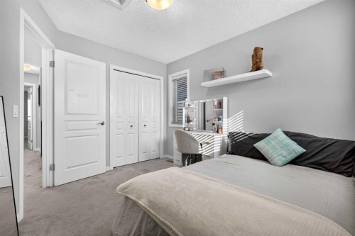 213 Auburn Meadows Way Se, Calgary, AB - Indoor Photo Showing Bedroom