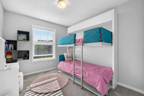 213 Auburn Meadows Way Se, Calgary, AB - Indoor Photo Showing Bedroom